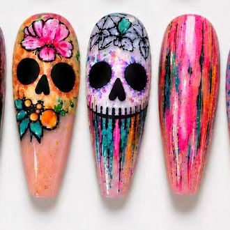 Colorful skull and floral illustrated nail designs