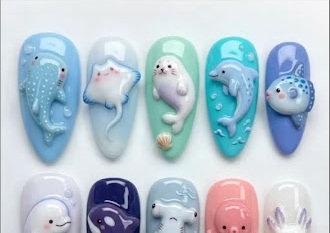 Pastel blue and white winter character nails
