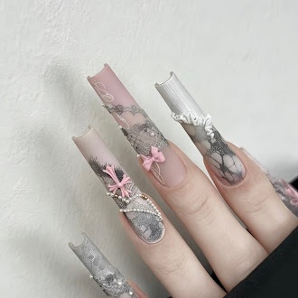 Soft pink, white, and silver floral nail art